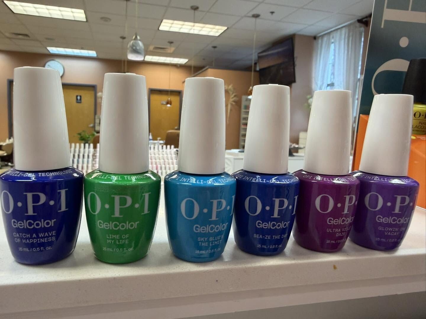 Row of OPI GelColor bottles in jewel tones