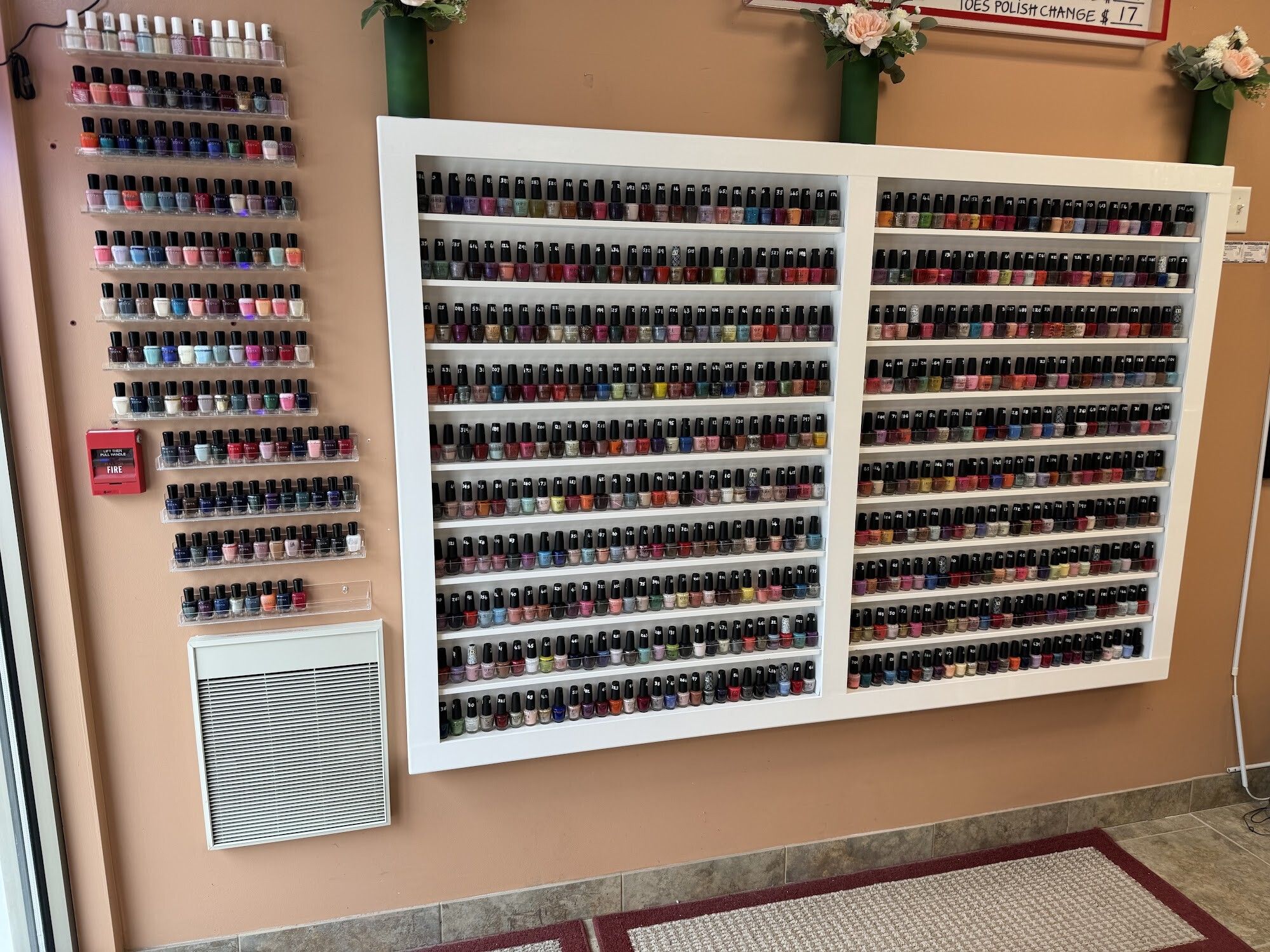 Wall of hundreds of nail polish colors